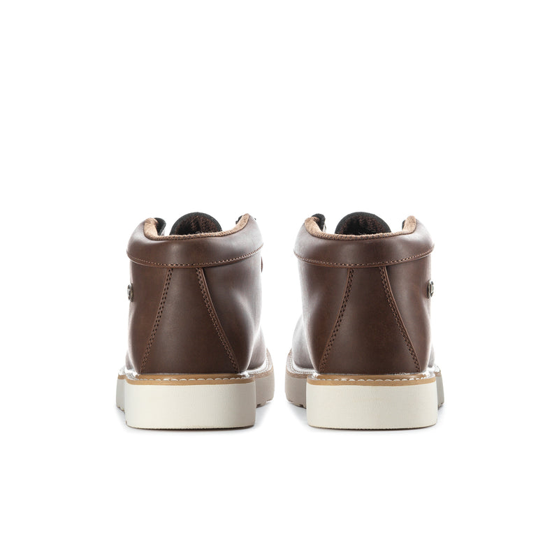 Men's chukka boots rear view, dark brown leather with padded heel and off-white sole