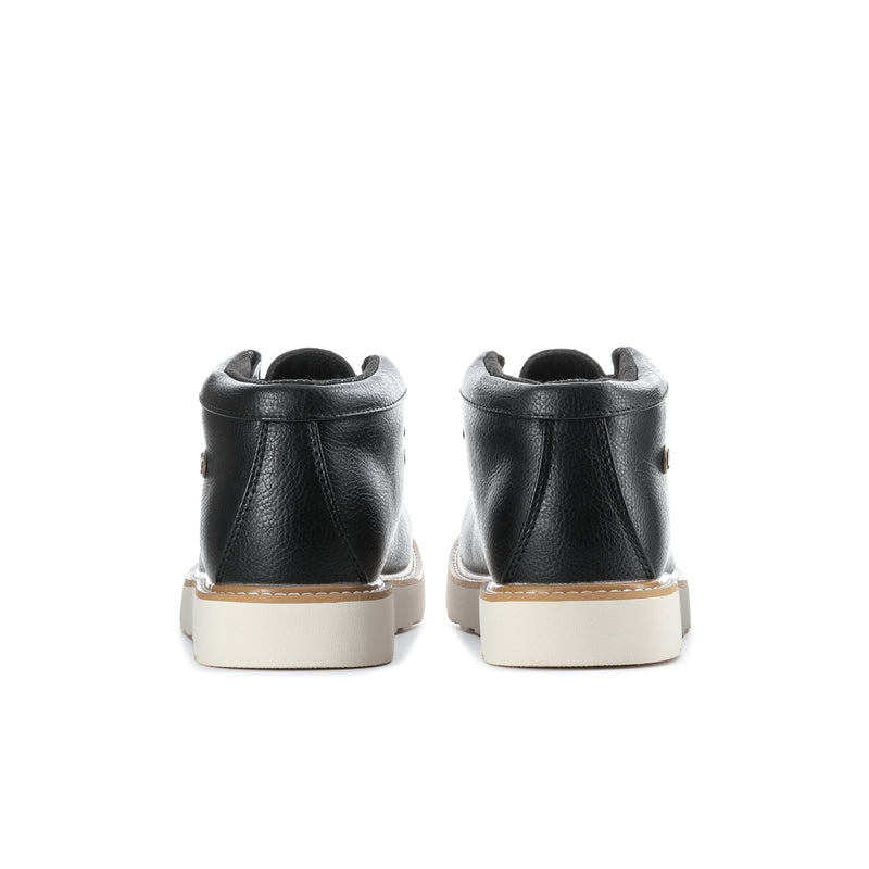 Men's black leather chukka boots, heel view with light tan heel cap