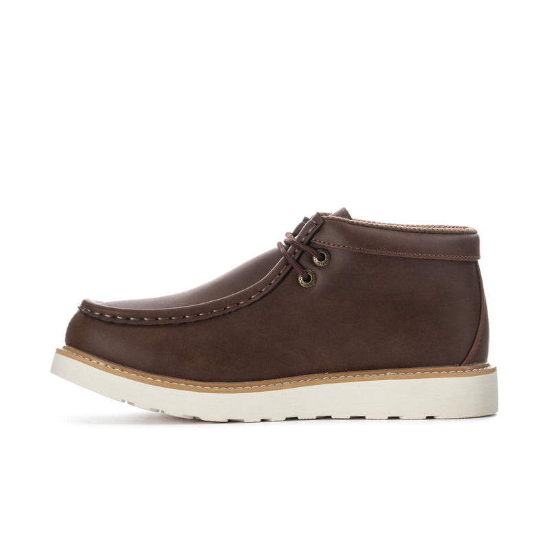Men's chukka boot side view, dark brown leather, lace-up eyelets, off-white sole