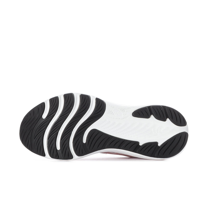 Women's running shoe outsole view with textured black rubber and white forefoot