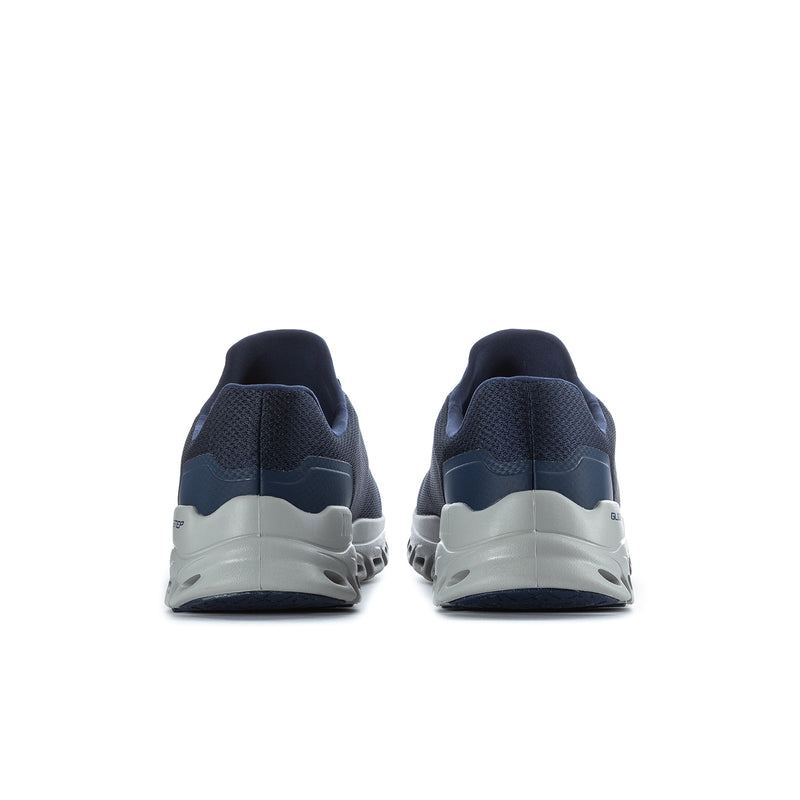 Men's navy sneakers with heel view and white/gray cushioning pods