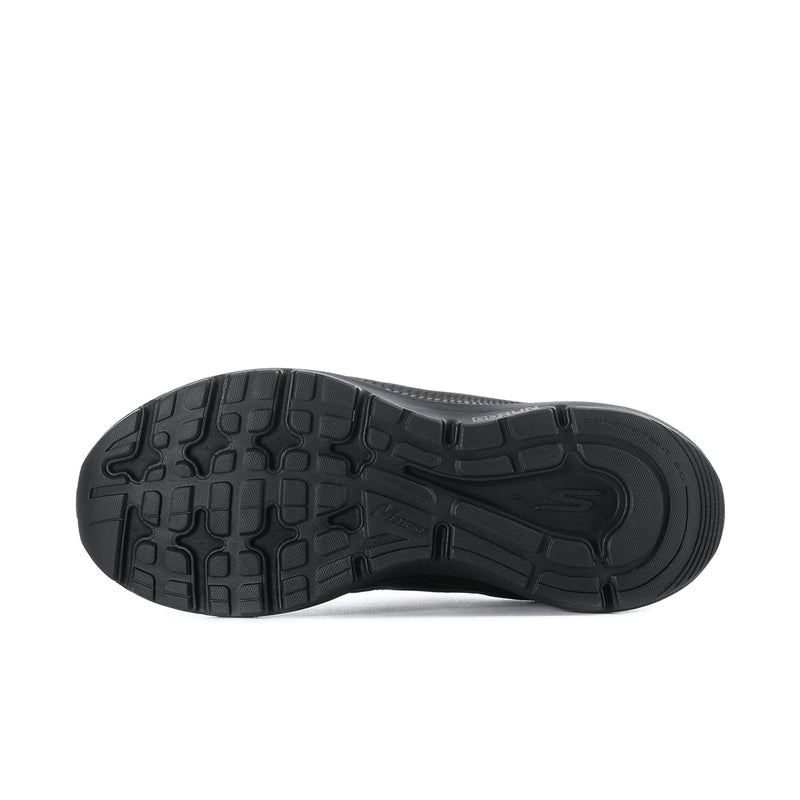 Women's black wide running shoes with textured rubber outsole tread