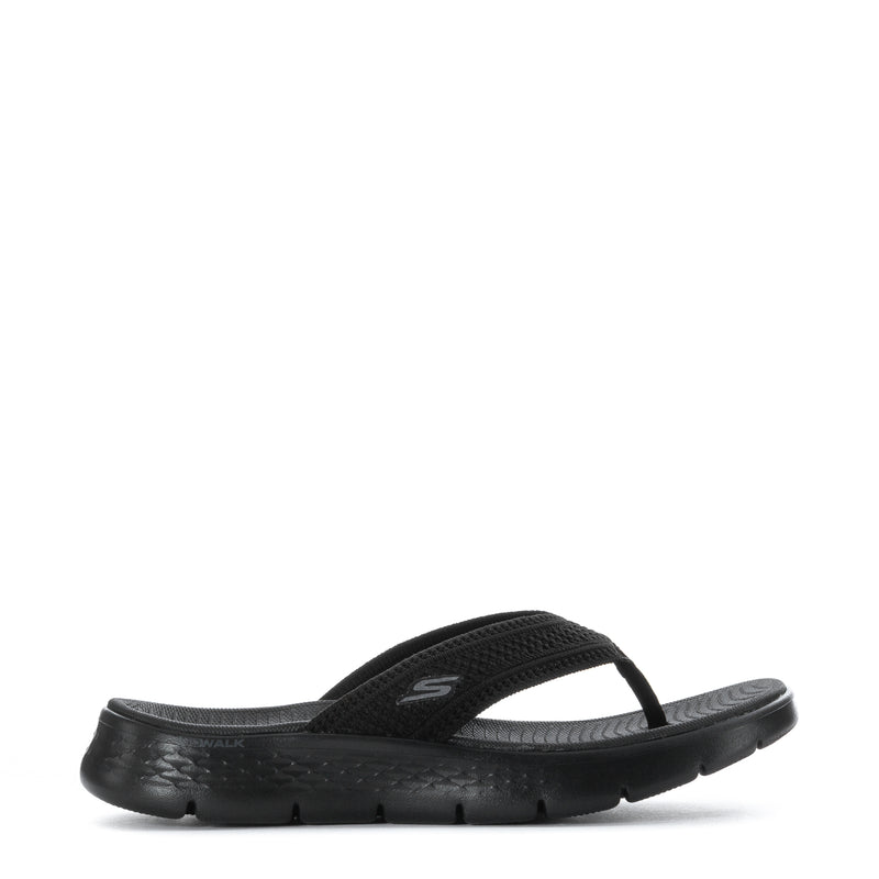 Women's black thong sandal with textured straps and cushioned sole