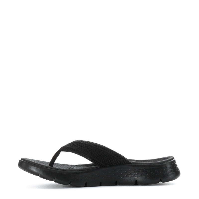 Women's black thong sandal, side profile with curved toe post