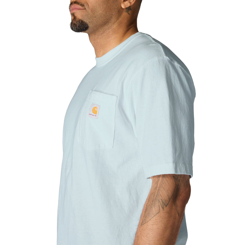 Light blue loose-fit pocket T-shirt, crew neck with chest pocket detail.