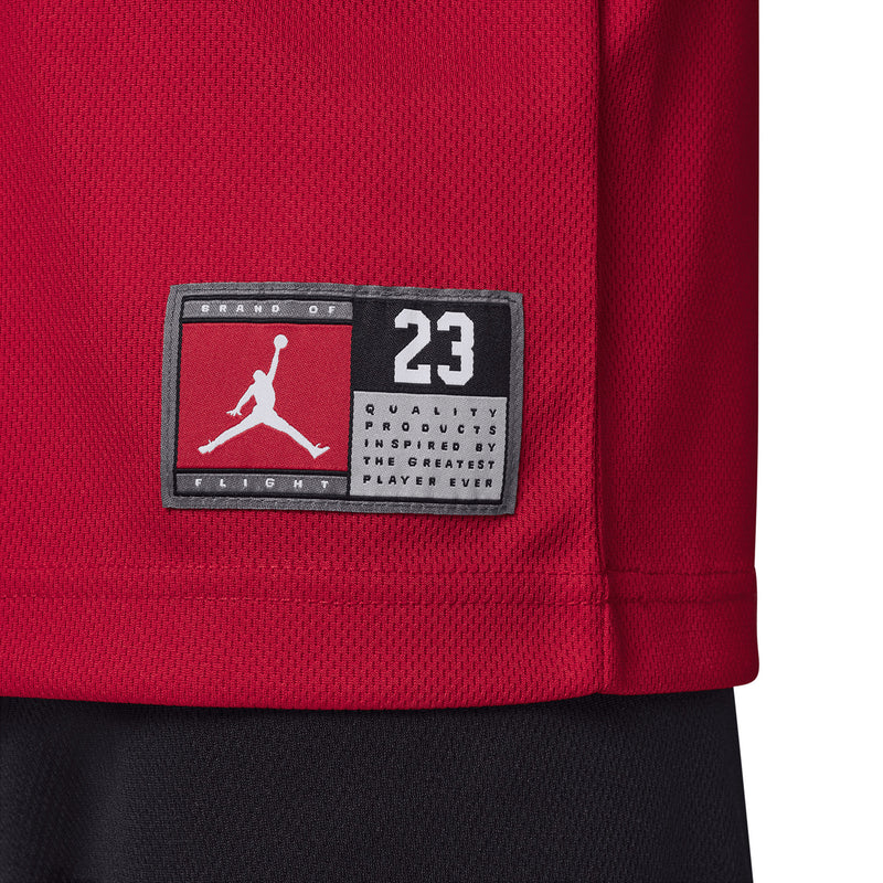Red jersey with Jordan label patch near hem