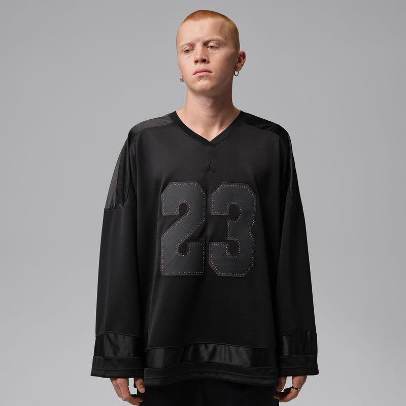 Men's black basketball jersey with 23 patch graphic and V-neck collar
