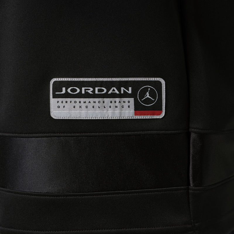 Men's black jersey hem with Jordan logo patch and product tag