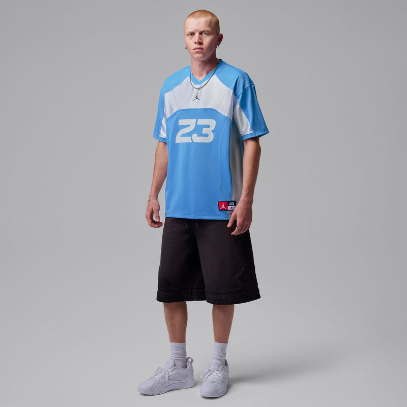 Men's Jordan 23 mesh jersey, University Blue and white, worn with black shorts