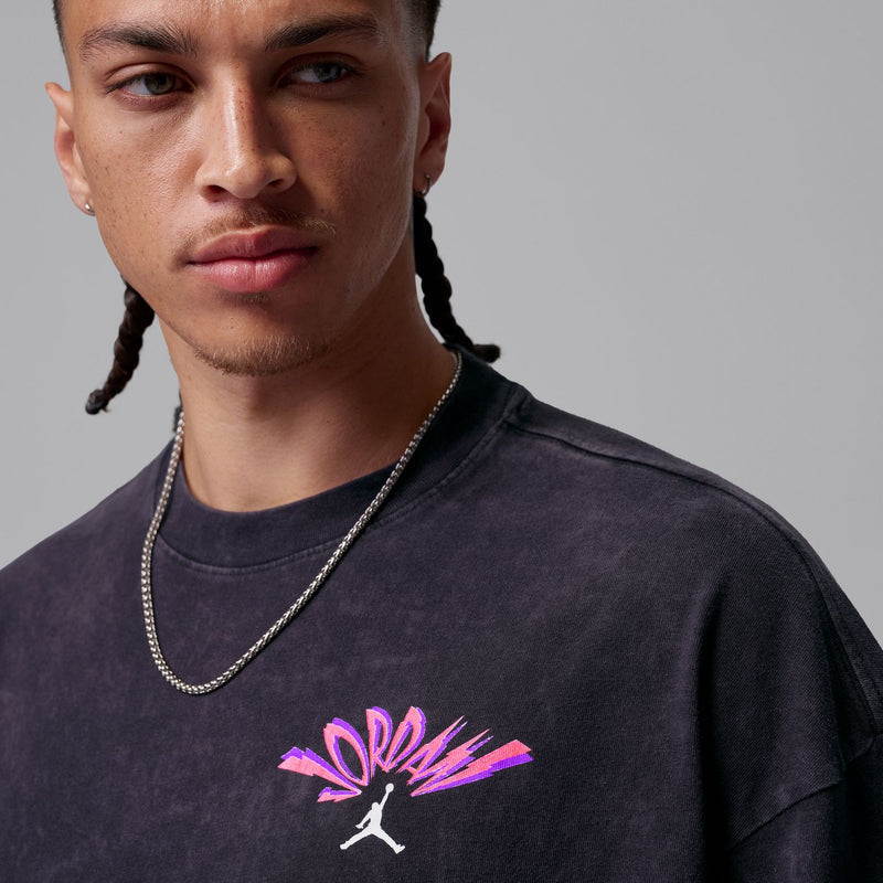 Washed black crewneck T-shirt with pink Jordan logo graphic on chest