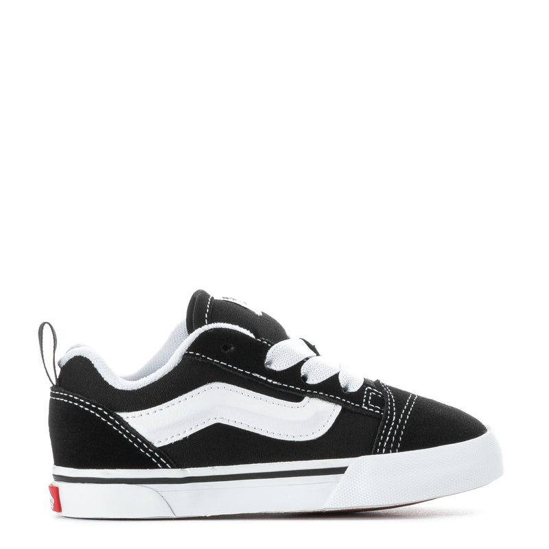 Toddler black and white sneakers, lace-up with white side stripe and low rubber sole