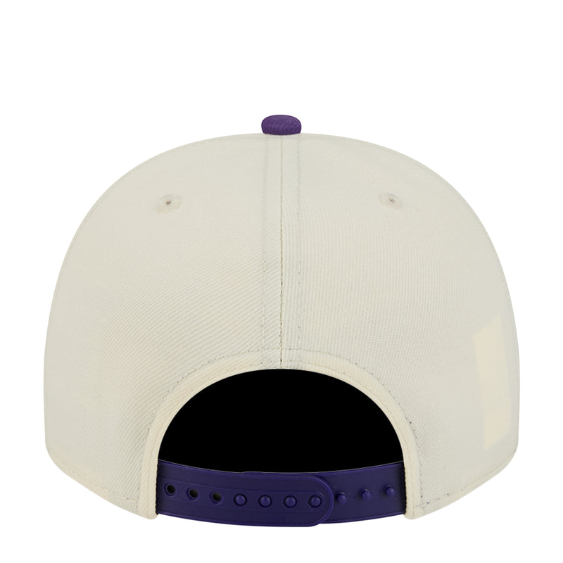 Cream A-Frame baseball cap with purple snapback strap and open front