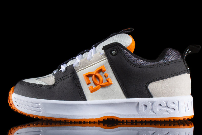 DC Lynx OG x Kevin Bilyeu Style # ADYS100763-BO1 Color : White / Black / Orange