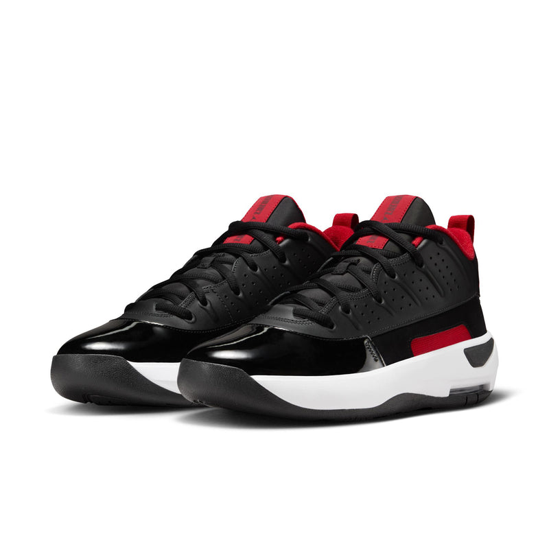 Men's black basketball shoes, side view pair with red heel detail and white midsole.