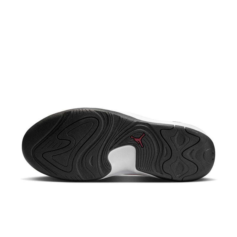 Men's black rubber outsole with red logo, textured traction pattern on the forefoot.