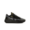 Youth black low-top sneaker with lace-up front and textured side panels, yellow logo