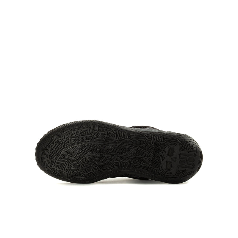 Youth black sneaker outsole with textured tread pattern