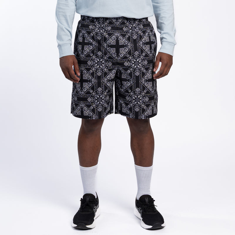Men's mesh-lined woven short, front view with black bandana pattern and side pockets