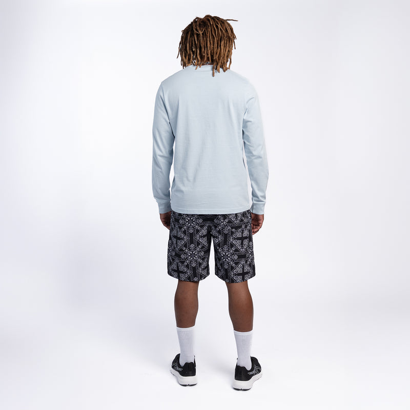 Men's mesh-lined woven short, back view in black bandana print with straight hem
