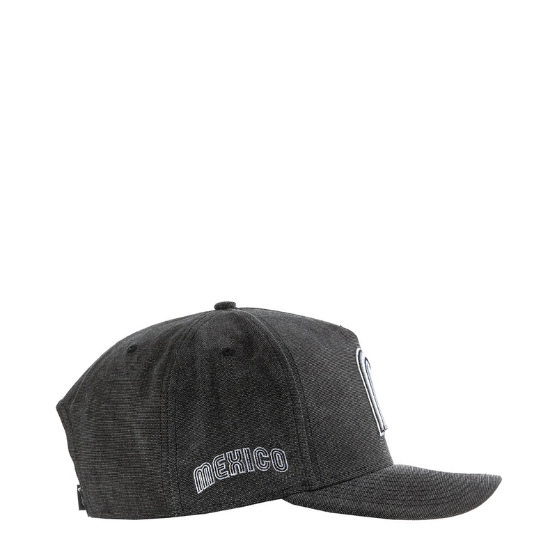 Washed black denim baseball cap with white MEXICO text logo on side