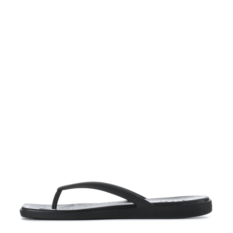 Women's black flip-flop sandal with curved thong strap and textured footbed
