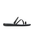 Black toe loop sandal with studded straps and Crocs logo, flat slide sole
