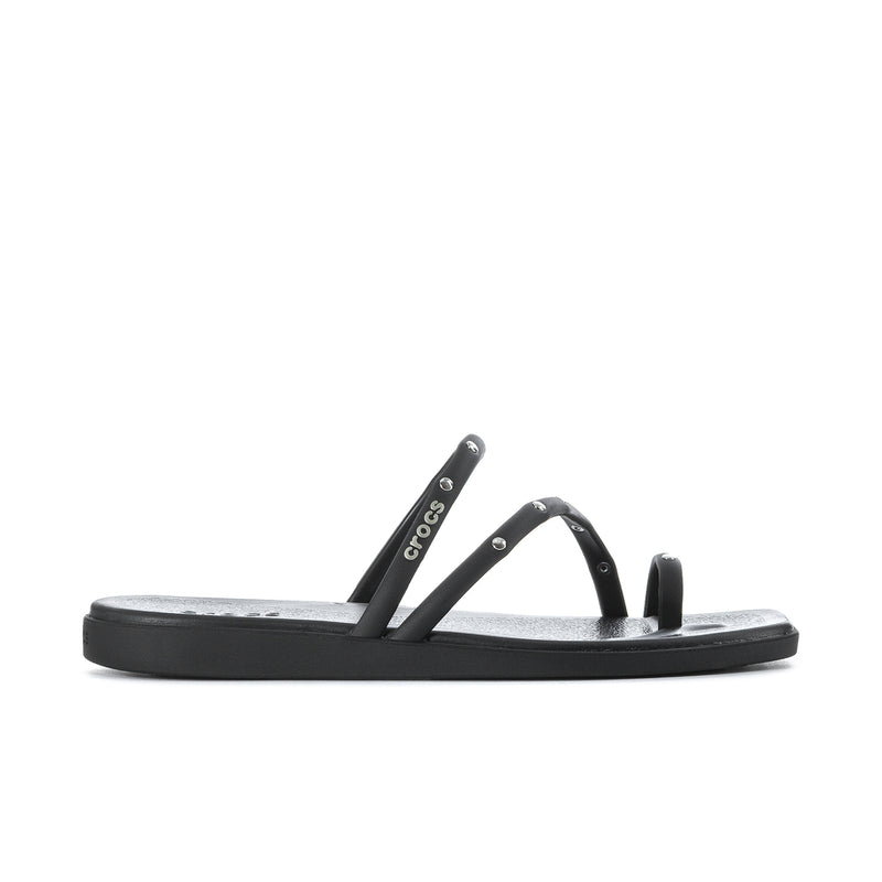Black toe loop sandal with studded straps and Crocs logo, flat slide sole