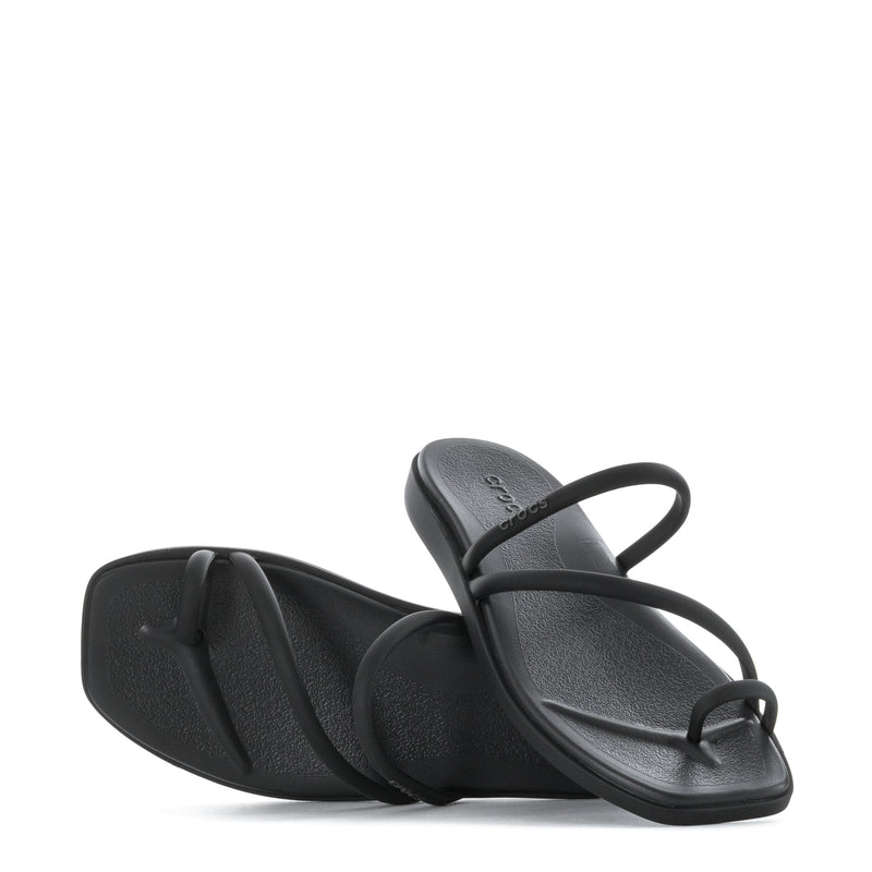 Black toe-loop sandals pair, showing contoured footbeds and straps