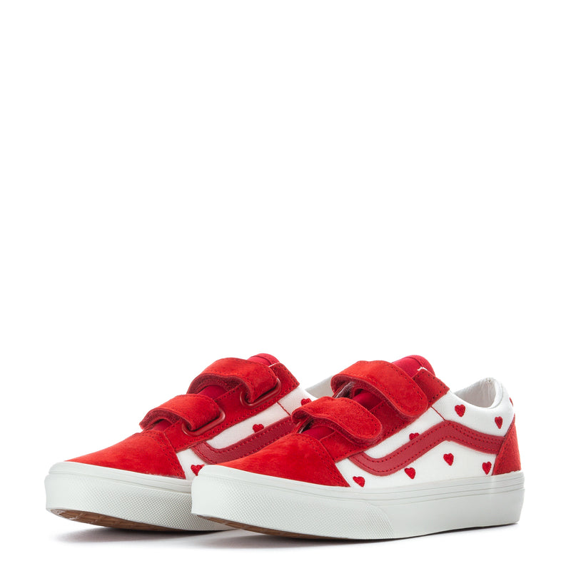 Kids red and white heart-print sneakers with two Velcro straps, side view