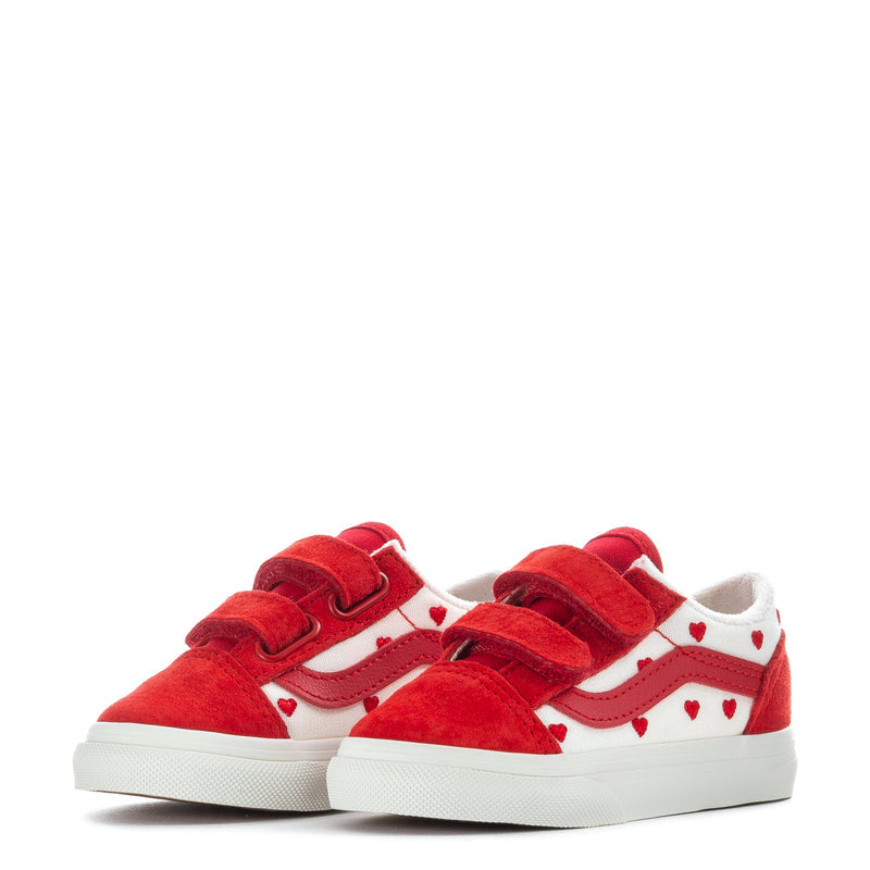 Toddler red and white sneakers pair, front view with heart details and hook straps