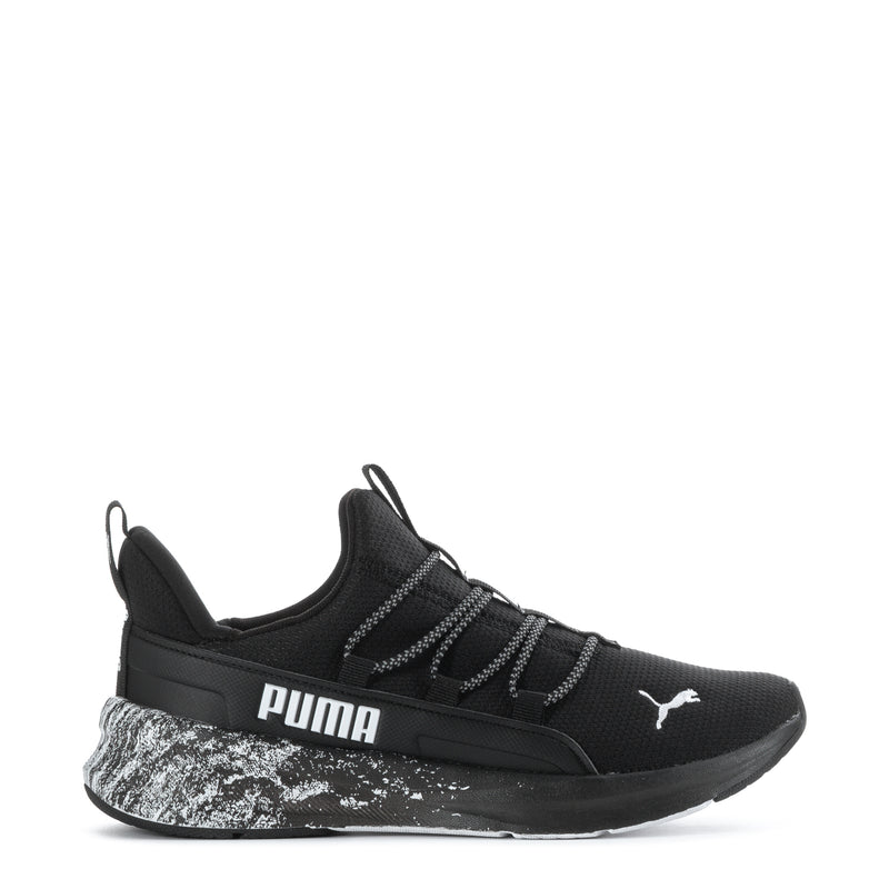 Black youth running shoe with knit upper, lace-up, white speckled midsole