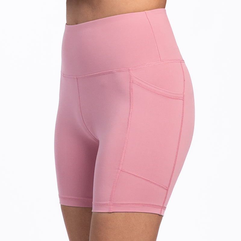 Women’s rose pink bike shorts with front pocket opening and contrast stitching