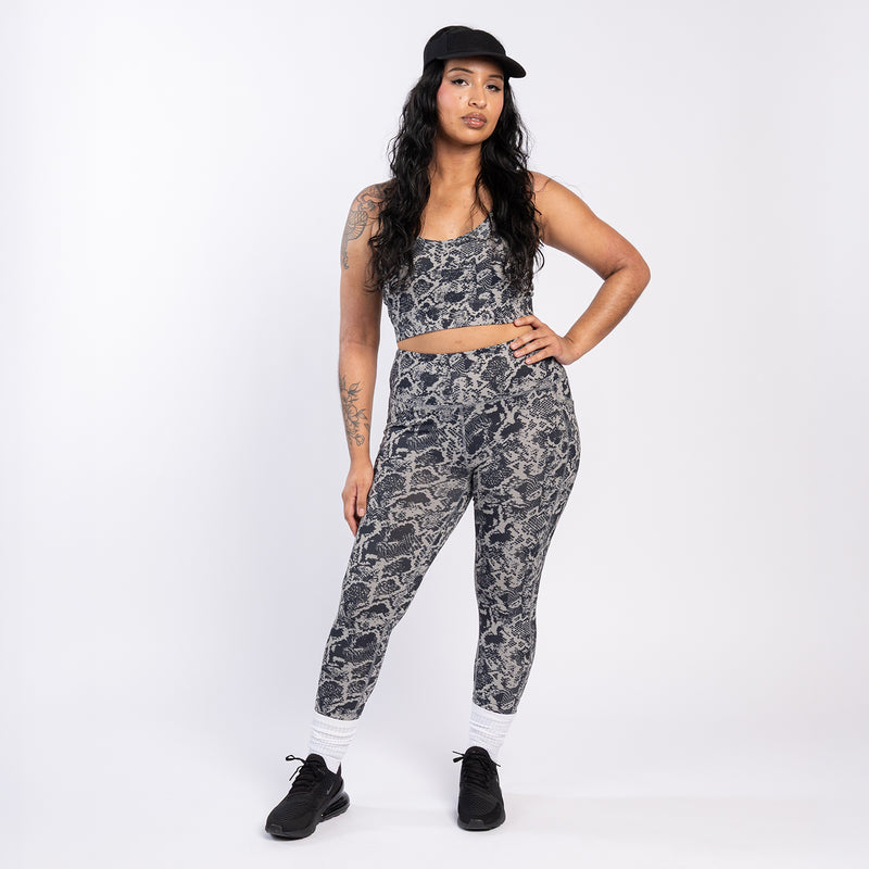 Snake print high-waist leggings with cropped waistband, dark gray and black