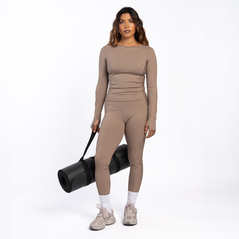 Taupe ribbed long-sleeve top worn with matching leggings