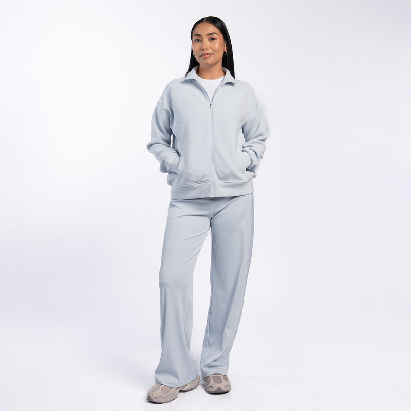 Light blue wide-leg knit pants, full length with straight drape