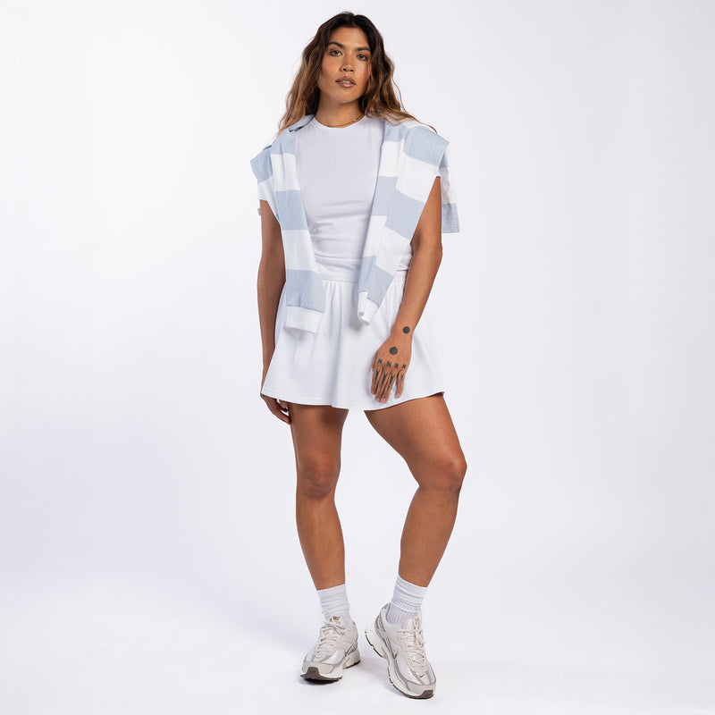 White mini skirt with elastic waistband and front tie, flared A-line hem