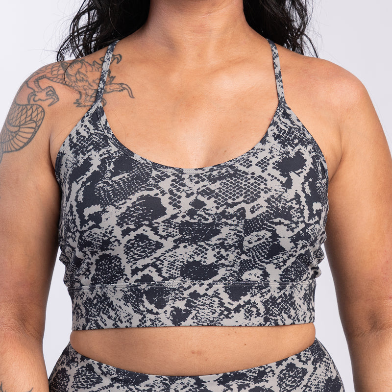Womens snake-print sports bra with scoop front and wide shoulder straps