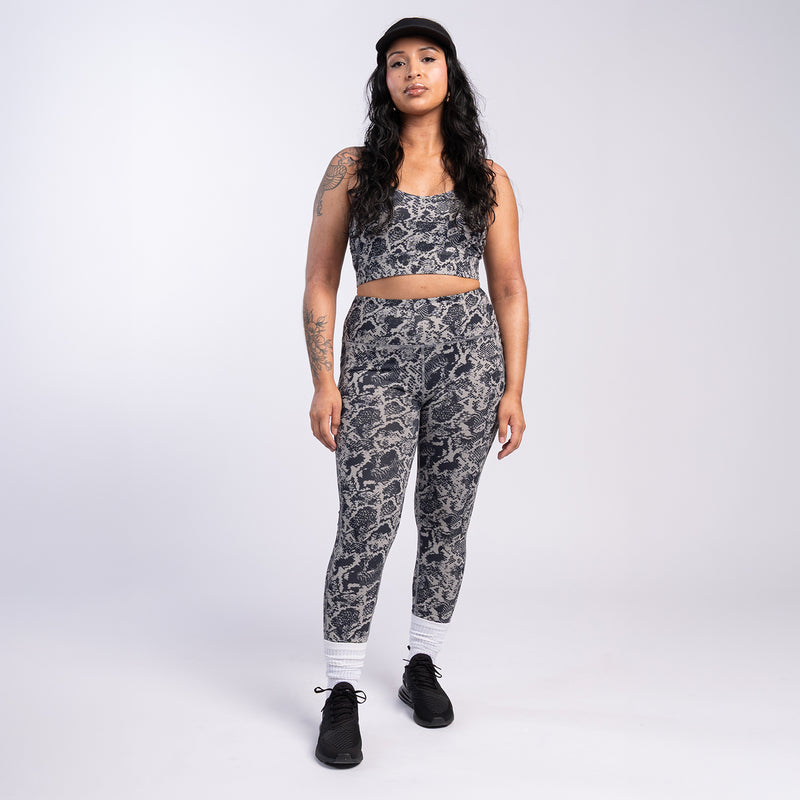 Womens snake-print sports bra with wide straps and cropped performance fit
