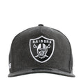 Washed black Raiders denim cap with white front shield logo embroidery