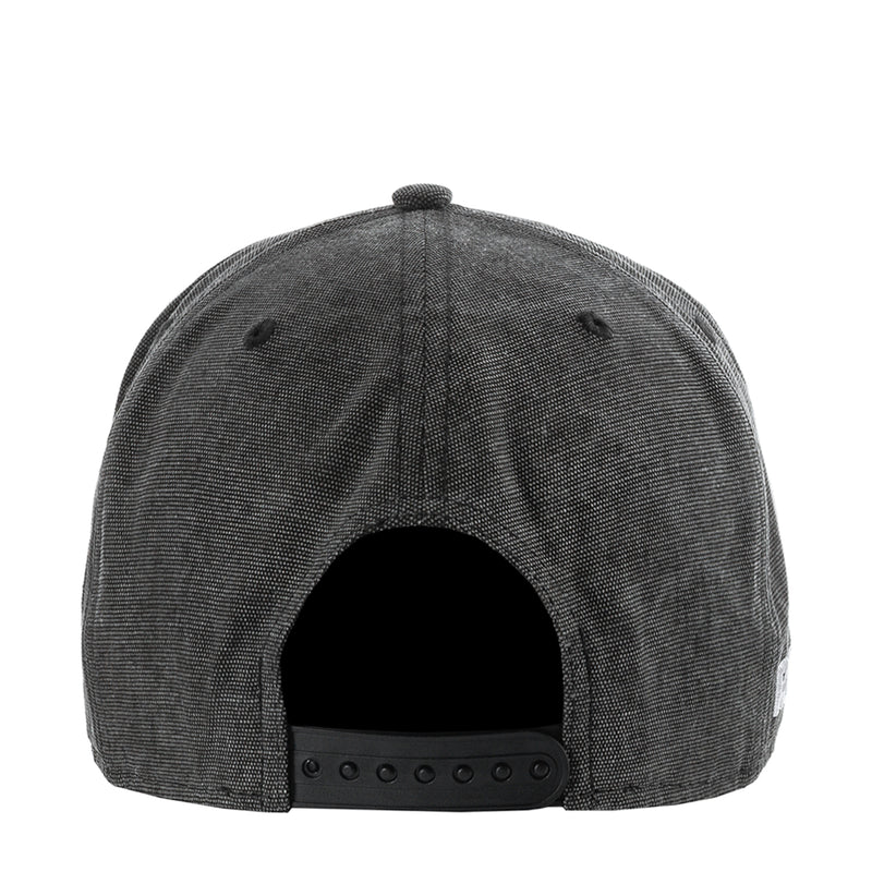 Washed black Raiders denim cap with adjustable back strap and vented panels