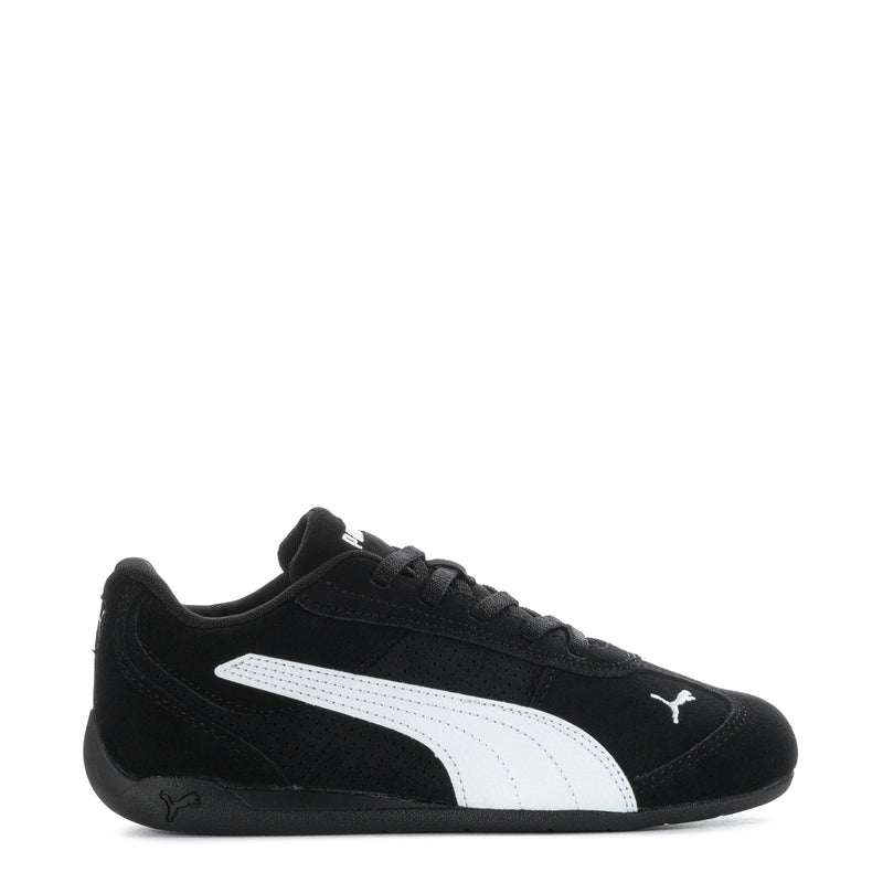 Kids black sneakers with white side stripe and Puma logo on tongue and quarter