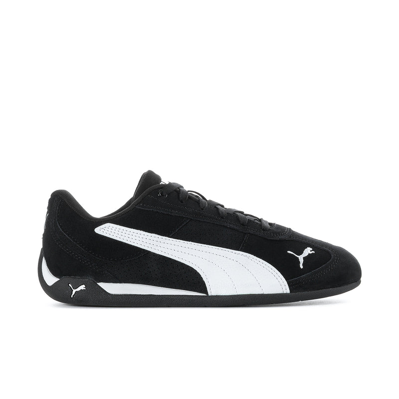 Women's black and white low-top lace-up sneakers with PUMA logo