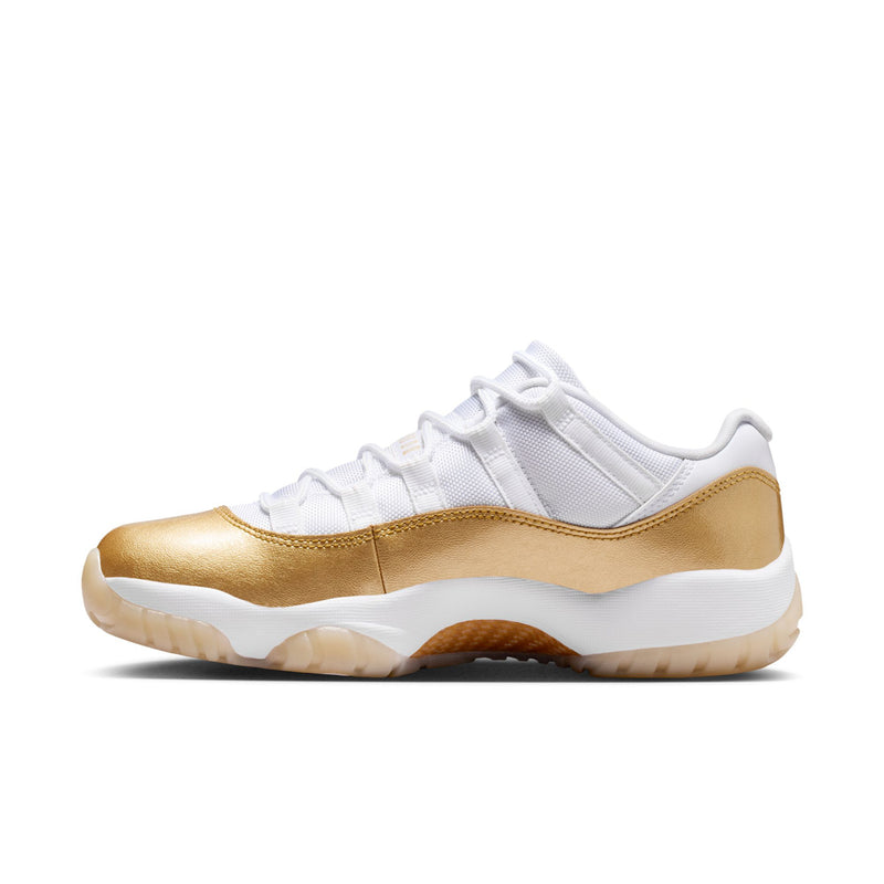 Side view of white lace-up sneakers with metallic gold panels and white midsole
