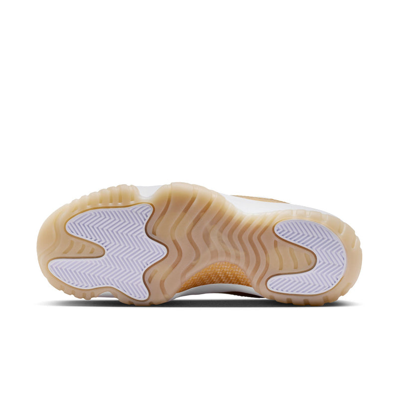 Shoe outsole with patterned traction and beige rubber sidewall