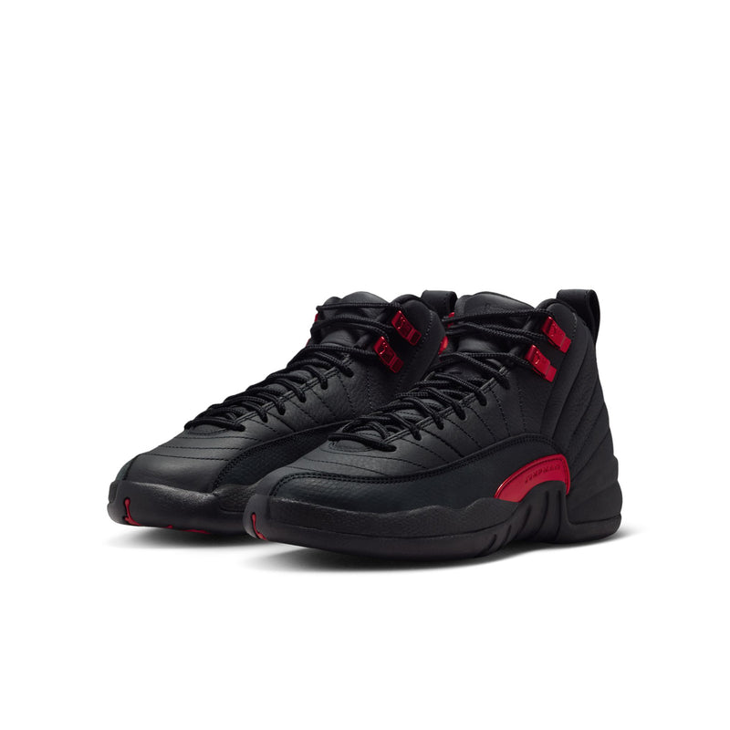 Youth high-top sneakers, side view: black uppers with red strap and accent