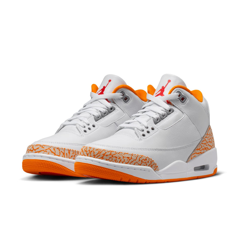 Pair of white Air Jordan Retro 3 sneakers with orange outsole and elephant-print toe