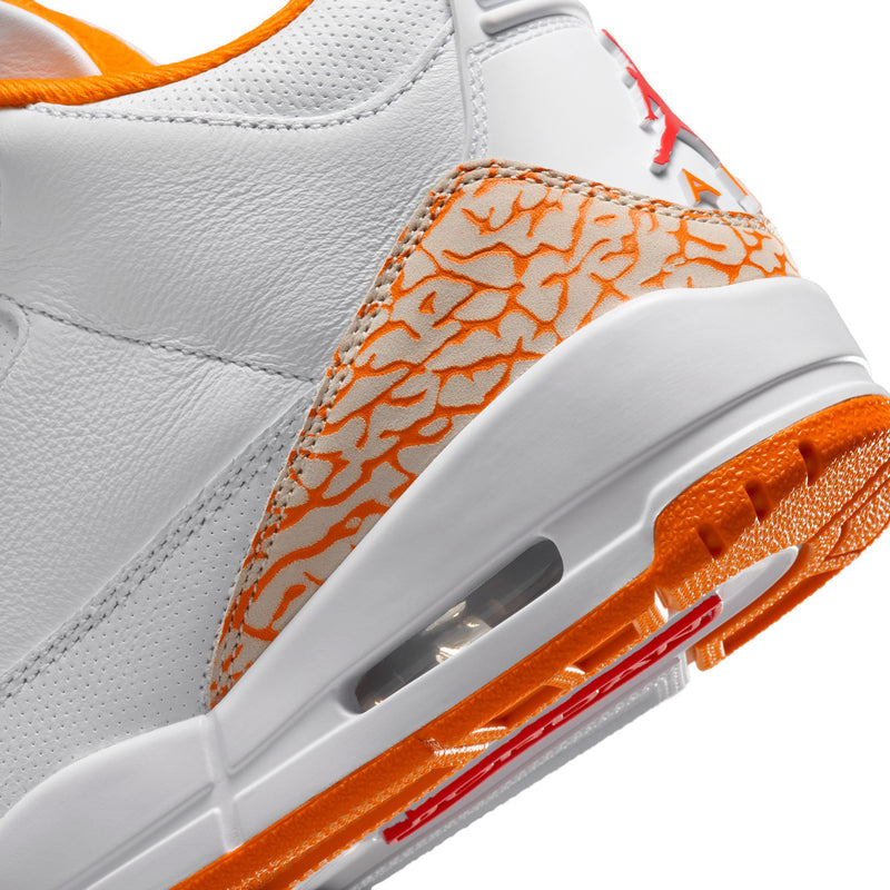 Close-up of Air Jordan Retro 3 midsole with visible air window and orange tread