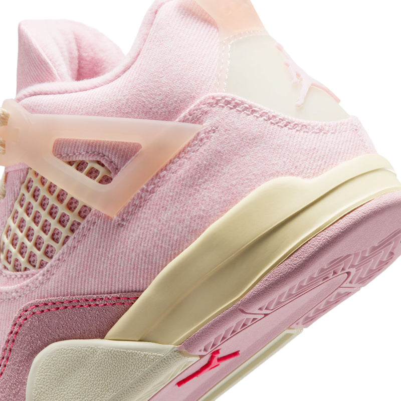 Kids pink and cream sneaker close-up showing padded collar and side sole stripe