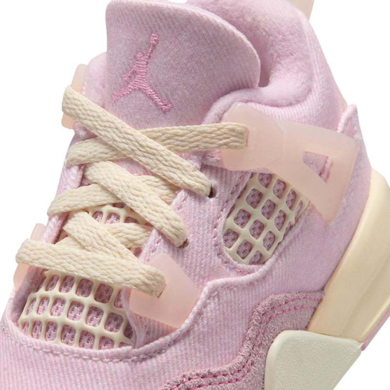Close-up of toddler pastel pink sneaker with lace, mesh panel, and Jordan logo