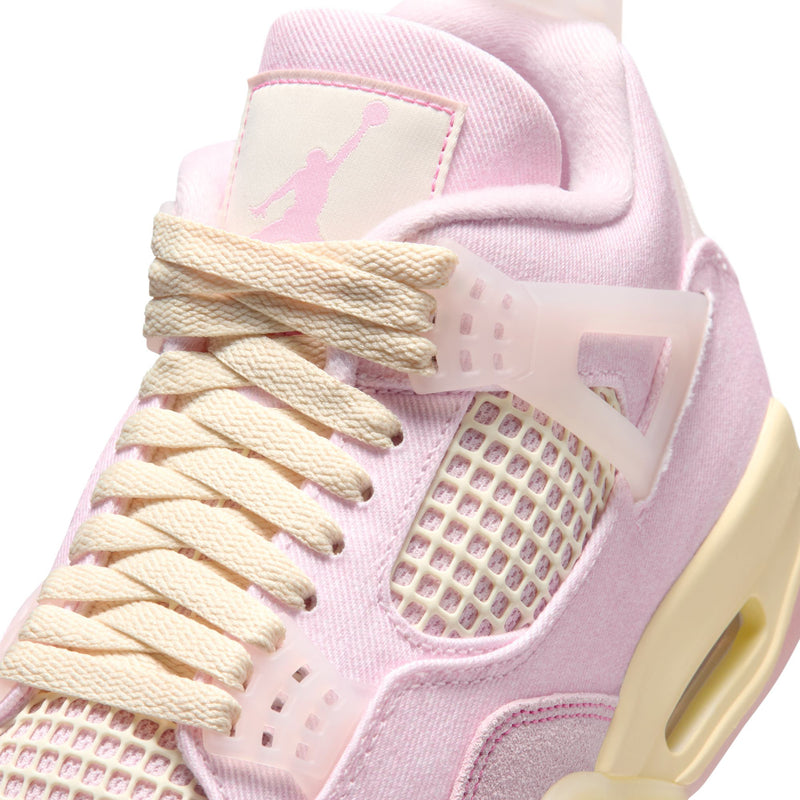 Close-up of light pink retro 4 sneaker upper with cream laces and netted side panel